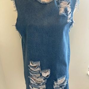Women’s blue jean top and shoes.